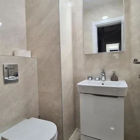 Апартаменты With Garage